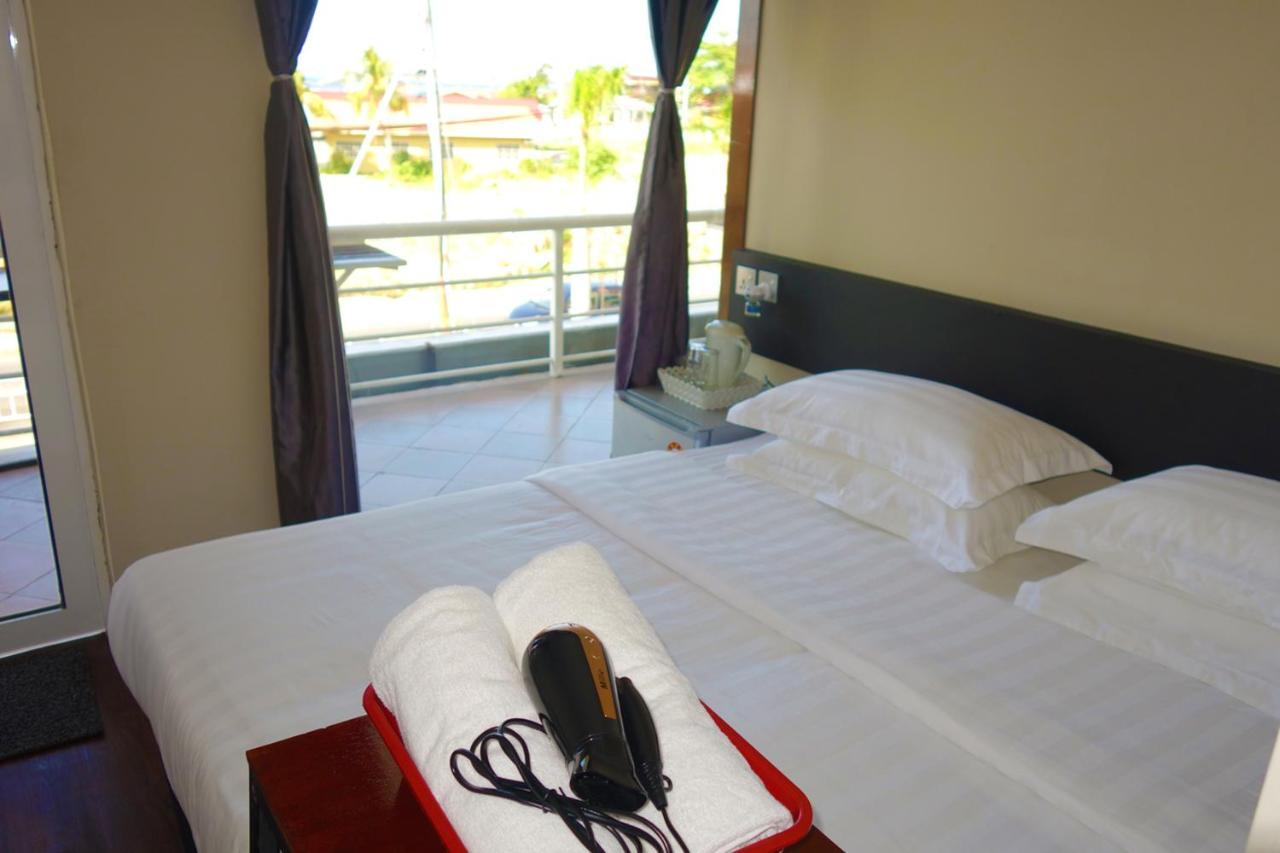 Ae Semporna Guesthouse 极潜旅店 Екстериор снимка