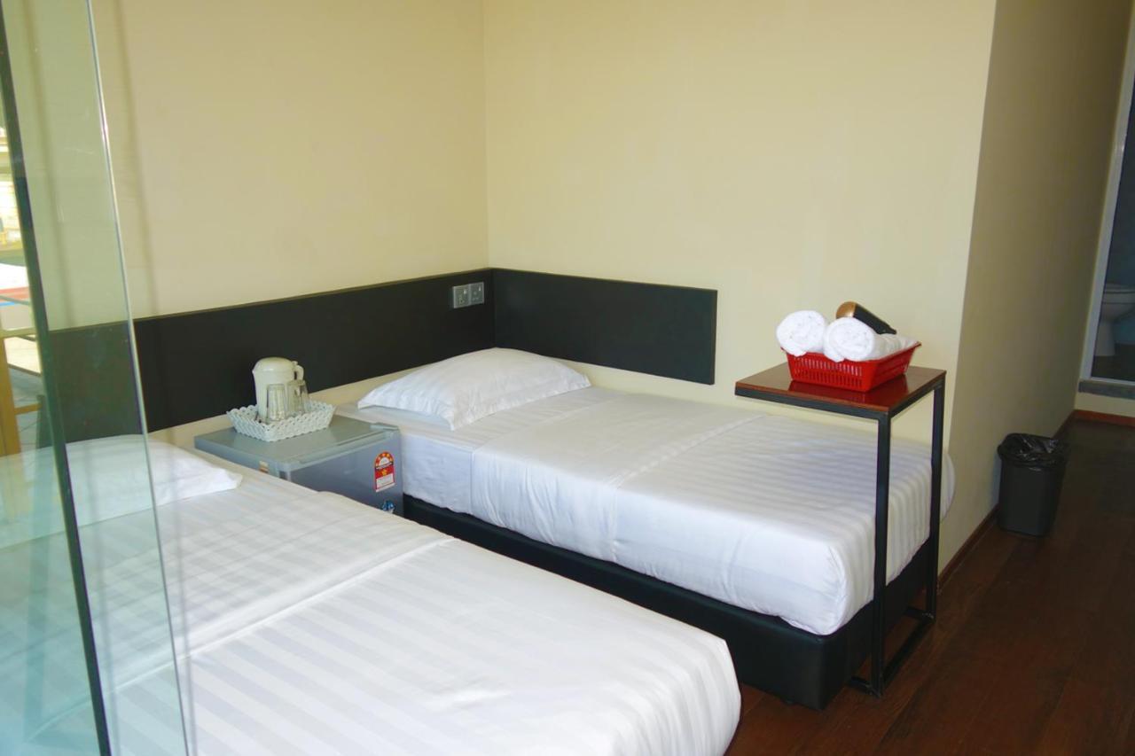 Ae Semporna Guesthouse 极潜旅店 Екстериор снимка