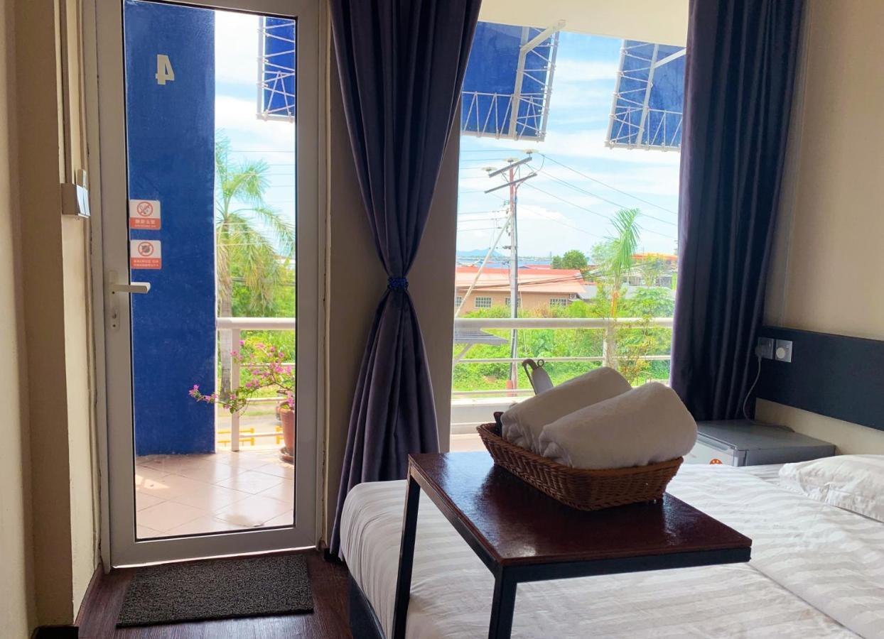 Ae Semporna Guesthouse 极潜旅店 Екстериор снимка