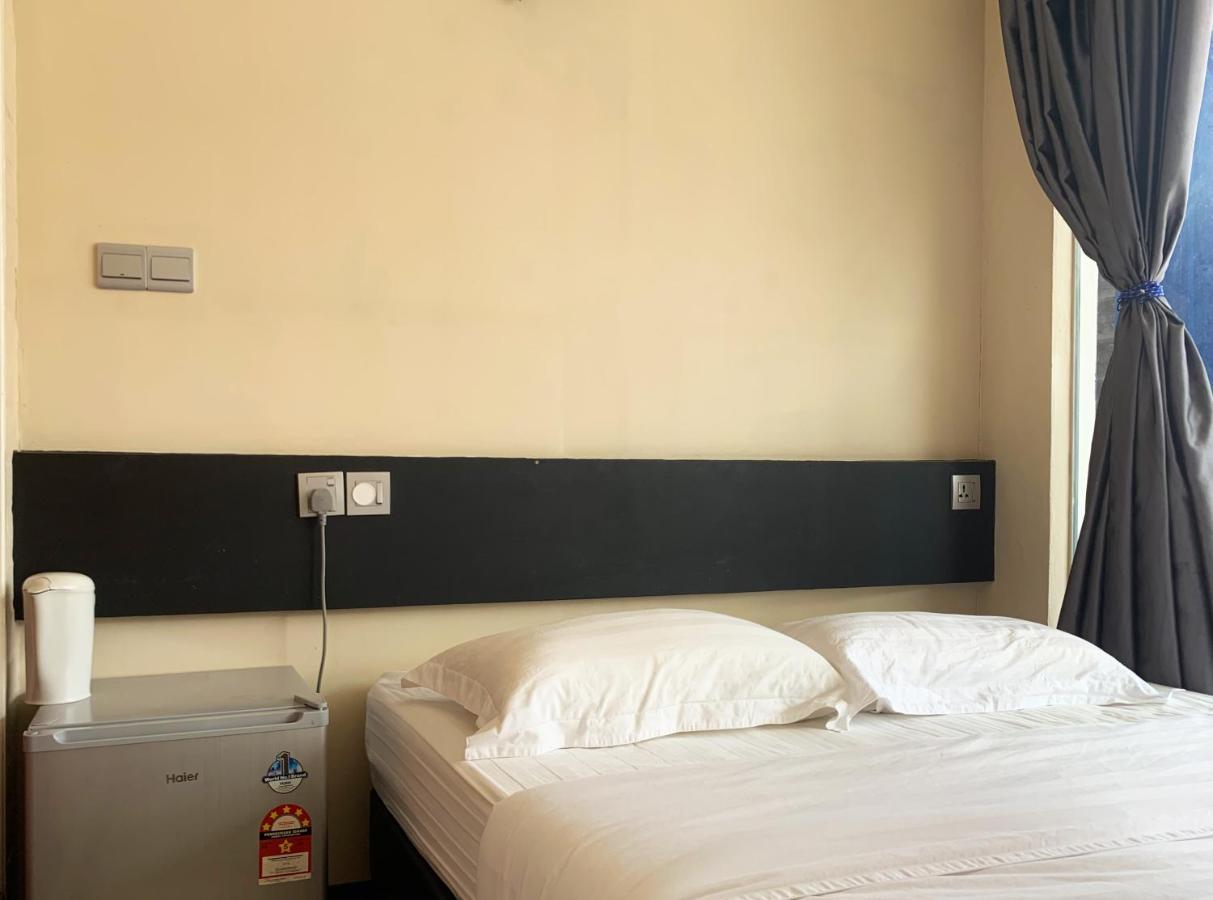 Ae Semporna Guesthouse 极潜旅店 Екстериор снимка