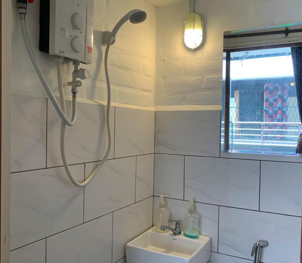Ae Semporna Guesthouse 极潜旅店 Екстериор снимка